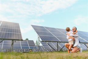 Mother and son enjoying clean solar energy at home